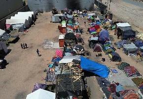 Miles de migrantes acampan en Chihuahua ante operativos en trenes